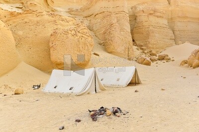 Bedouin tents among the mountains in Wadi El Hitan, Egypt