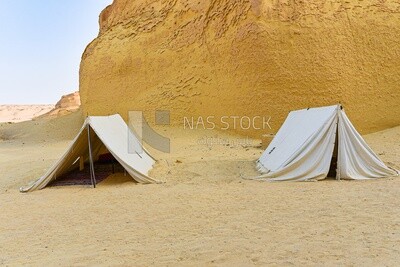 Bedouin tents among the mountains in Wadi El Hitan, Egypt