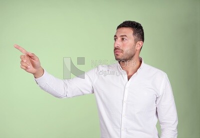 Portrait of a man wearing formal wear pointing away, business development and partnerships, business meeting, Model