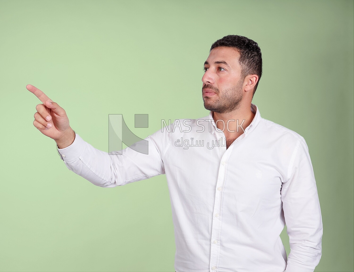 Portrait of a man wearing formal wear pointing away, business development and partnerships, business meeting, Model