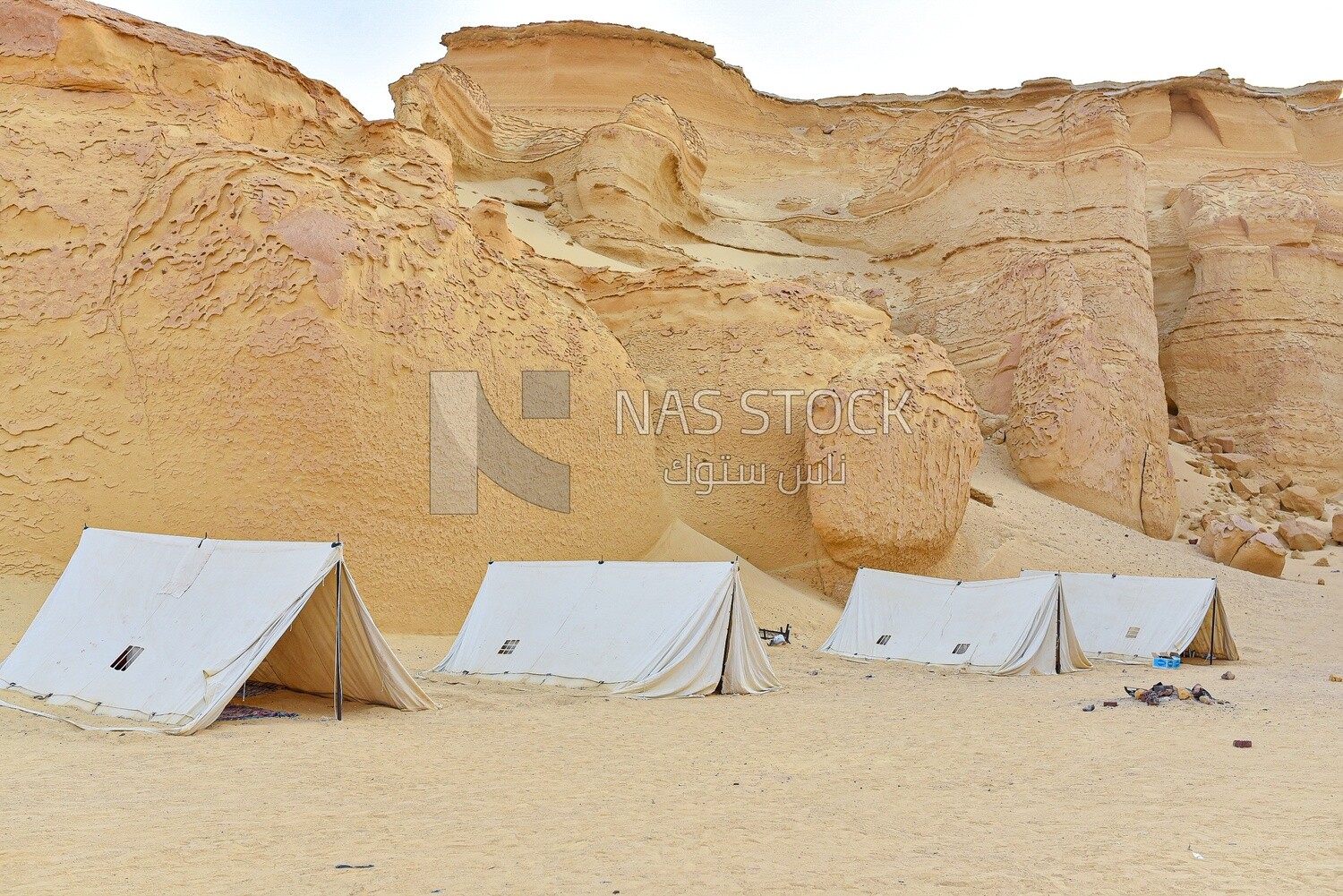 Bedouin tents among the mountains in Wadi El Hitan, Egypt