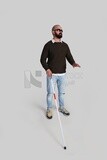 blind man wearing glasses and holding a stick