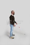 blind man wearing glasses and holding a stick