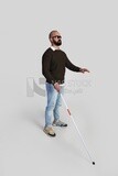 blind man holding a walking stick and wearing glasses