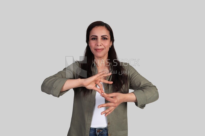 female teacher explaining sign language