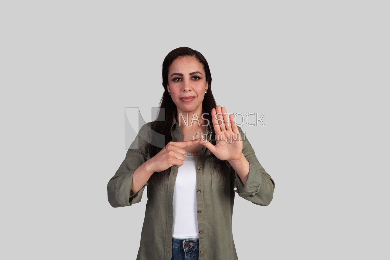 beautiful deaf young woman speaking in sign language