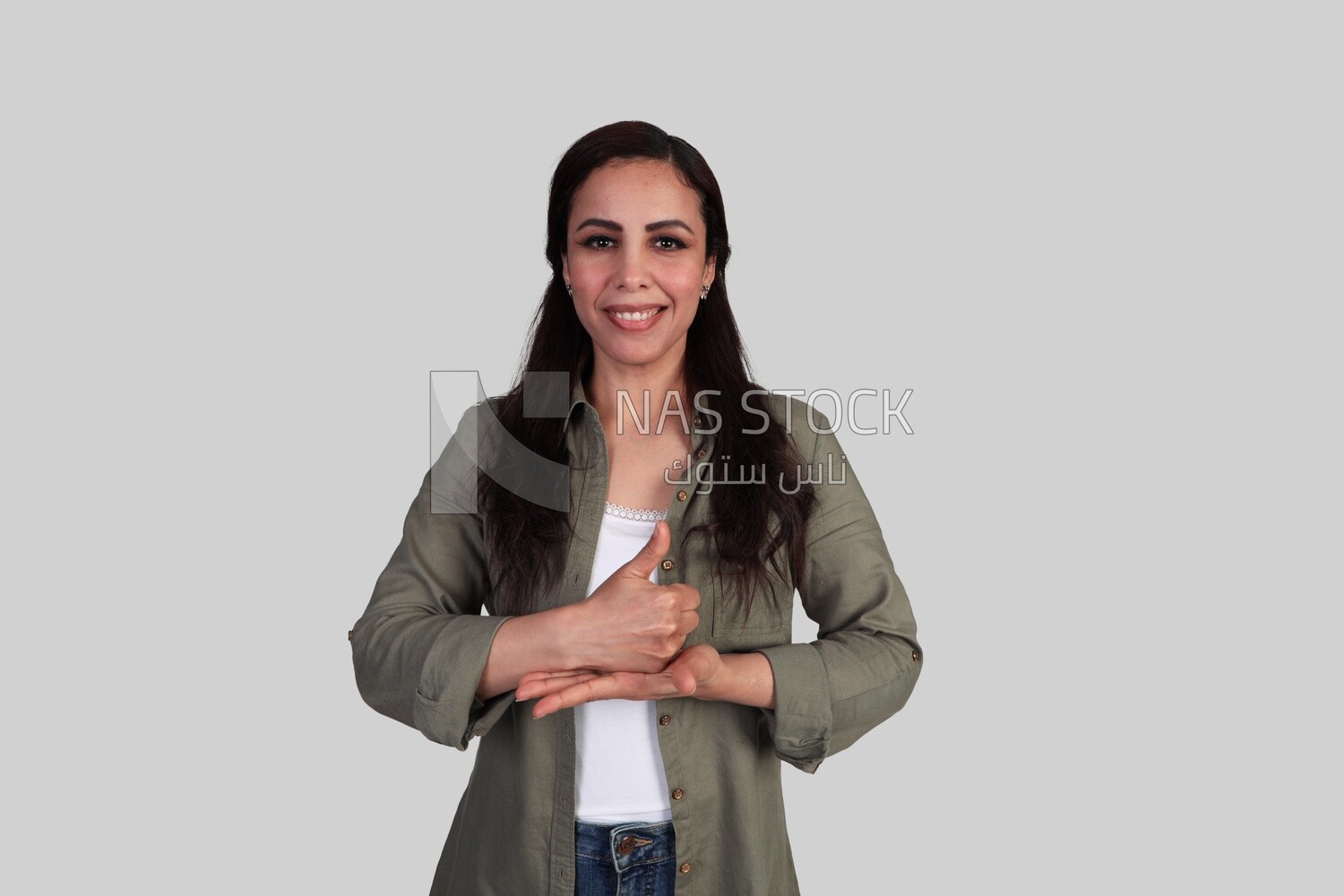 beautiful deaf young woman using sign language