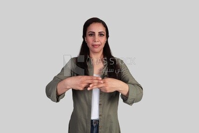 beautiful deaf young woman speaking in sign language