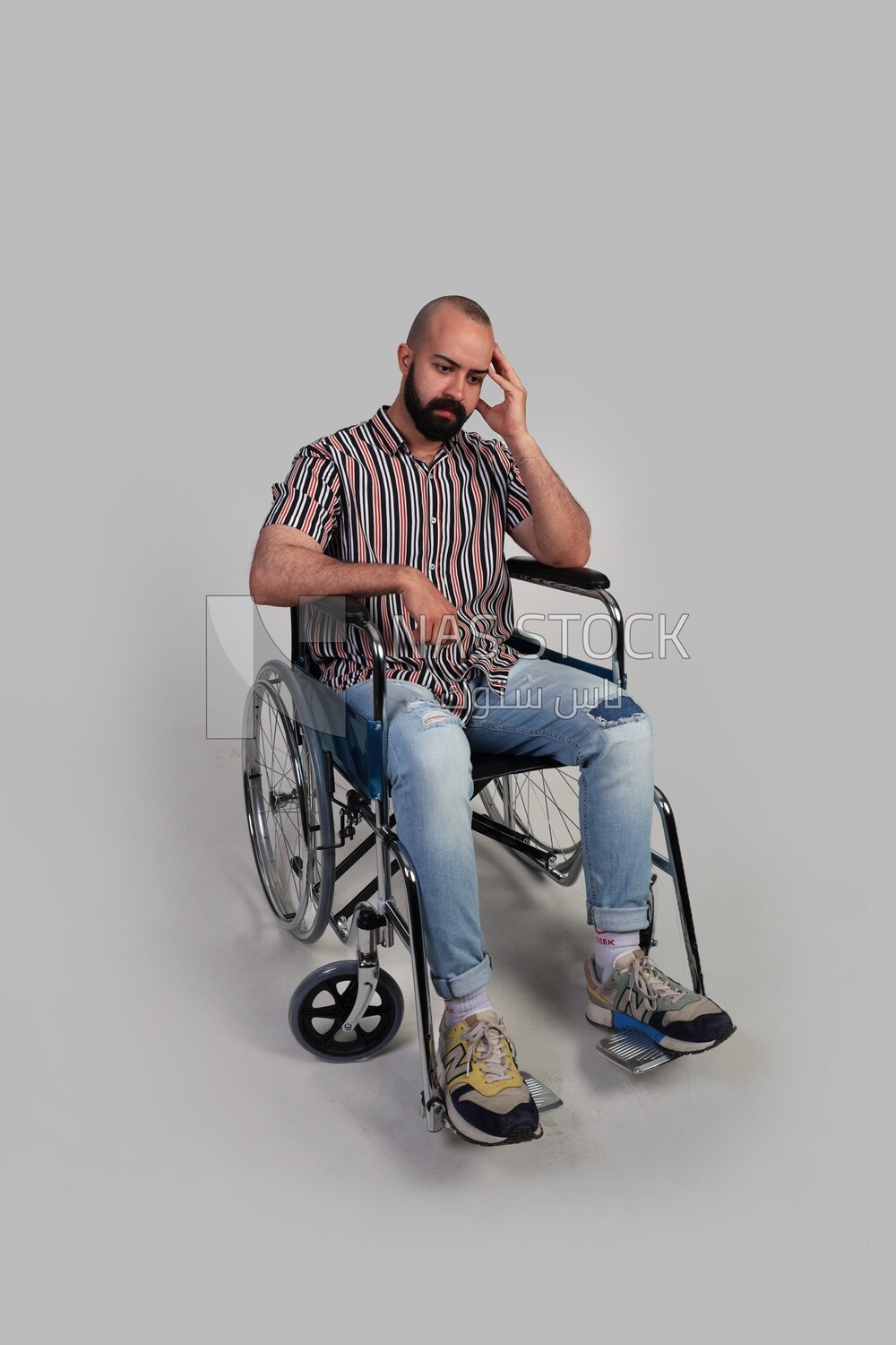 man sitting in a wheelchair, patient, the concept of medicine and health care, an appointment to receive treatment in the hospital, emergency.