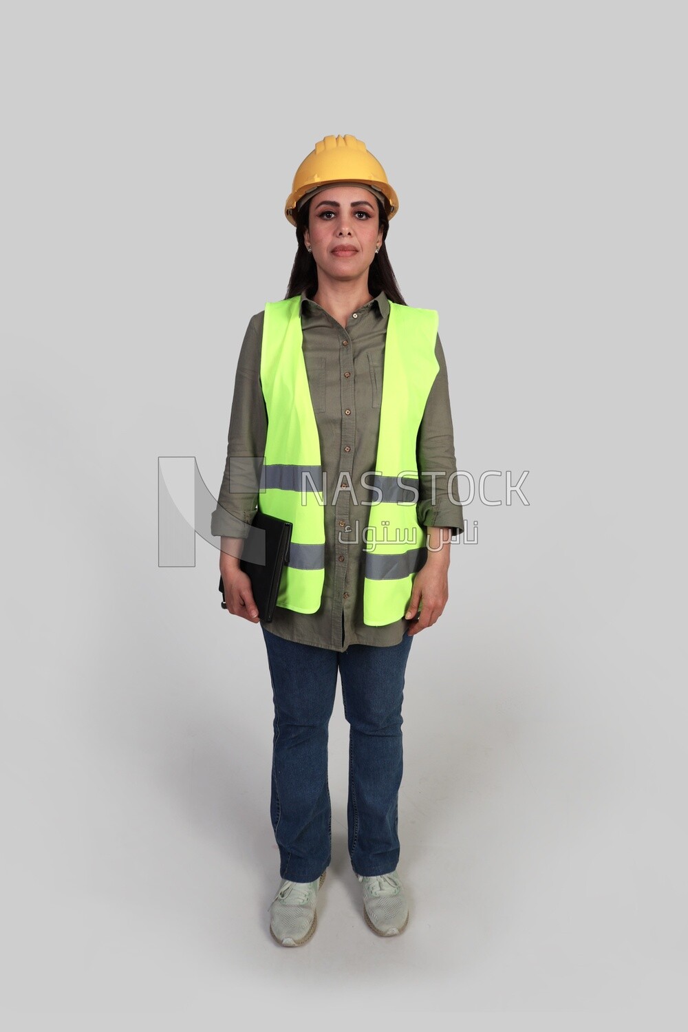 woman engineer holding a construction plan in her hand, a construction engineer wearing a work safety suit, work helmet, work uniform, construction project, white background
