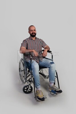 man sitting in a wheelchair, patient, the concept of medicine and health care, an appointment to receive treatment in the hospital, emergency.