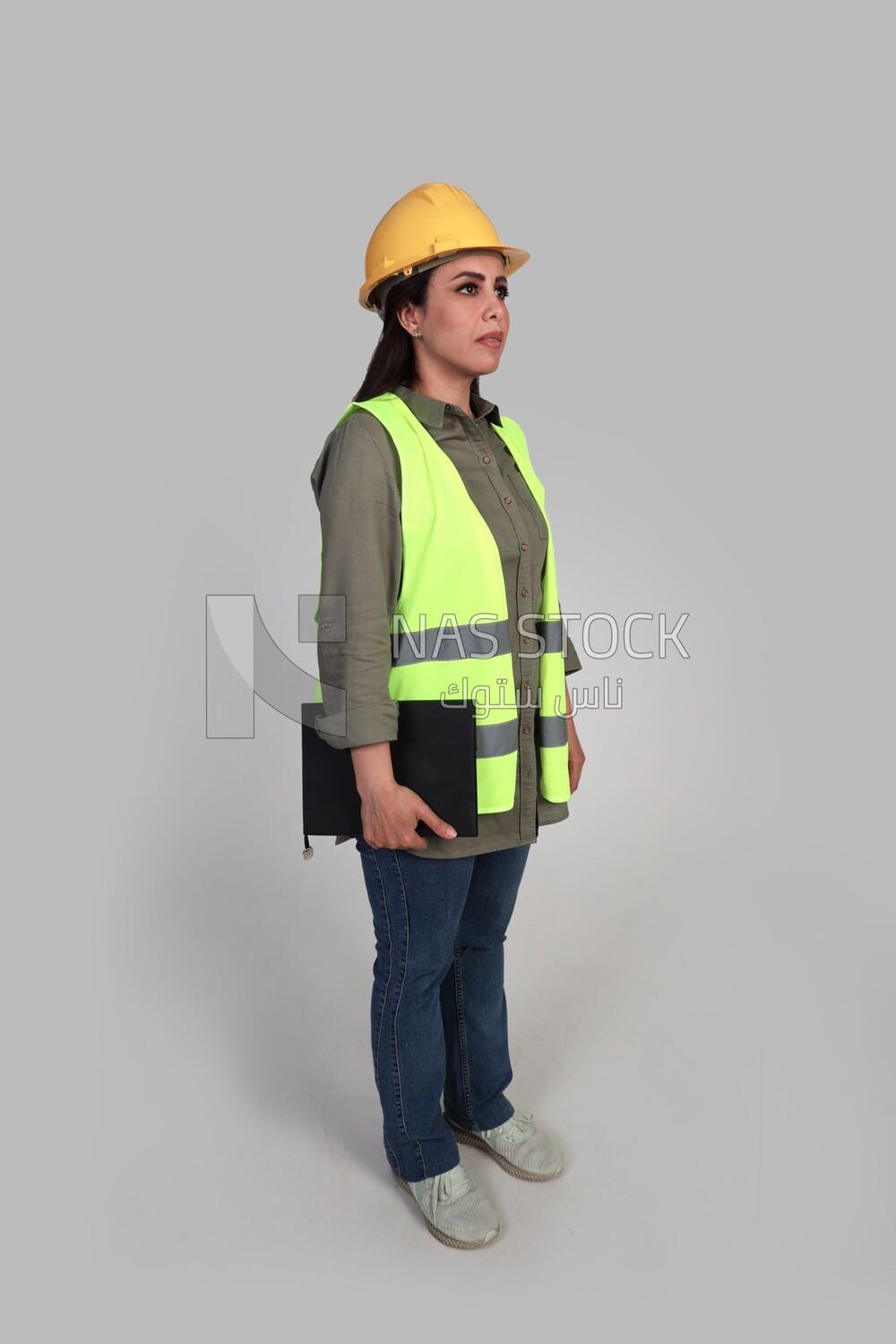 woman engineer holding a construction plan in her hand, a construction engineer wearing a work safety suit, work helmet, work uniform, construction project, white background