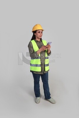 woman engineer holding a mobile phone, a construction engineer wearing a work safety suit, work helmet, work uniform, construction project, white background