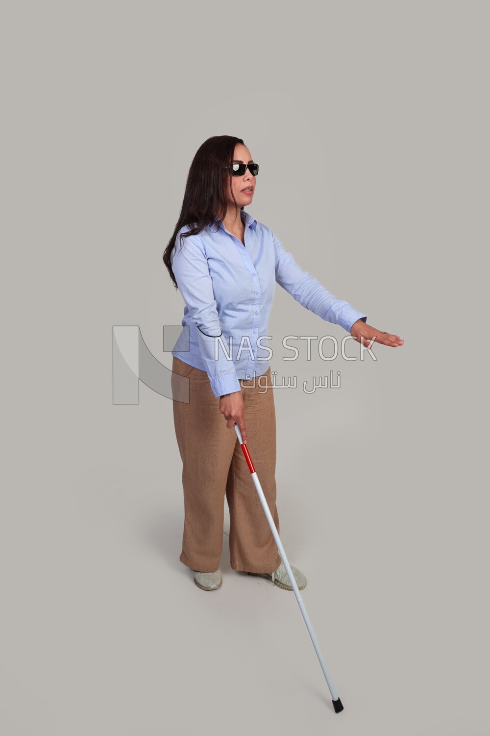 blind woman walking with a white cane, patient, medicine and health care concept, medical professions and jobs.