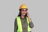 woman engineer holding a mobile phone, a construction engineer wearing a work safety suit, work helmet, work uniform, construction project, white background