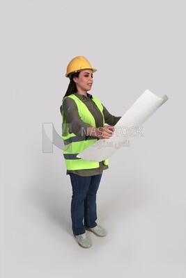 woman engineer holding a construction plan in her hand, a construction engineer wearing a work safety suit, work helmet, work uniform, construction project, white background