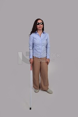 blind woman walking with a white cane, patient, medicine and health care concept, medical professions and jobs.