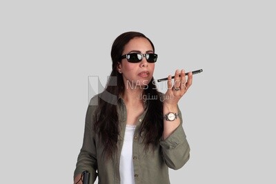 blind woman walking with a white cane holding her mobile, patient, medicine and health care concept, medical professions and jobs.