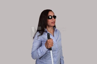 close up of a blind woman walking with a white cane, patient, medicine and health care concept, medical professions and jobs, disabled people