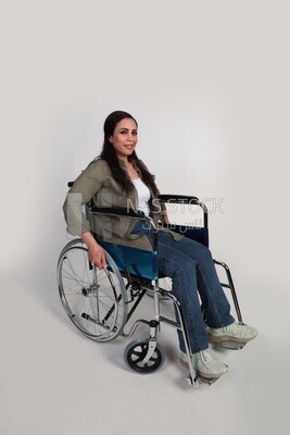 woman sitting in a wheelchair, patient, the concept of medicine and health care, an appointment to receive treatment in the hospital, emergency.