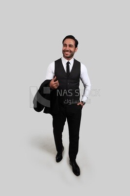 Photo of a businessman with a formal suit putting his hand in his pocket, business development and partnerships, business meeting, Model