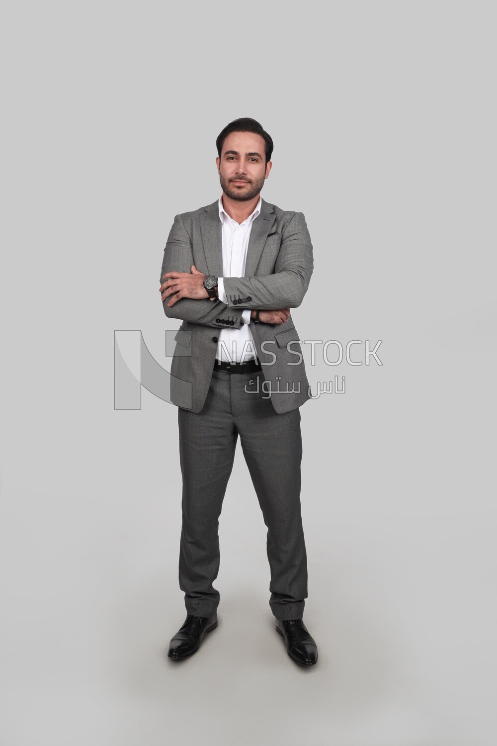 Photo of a businessman with a formal suit with crossed hands, business development and partnerships, business meeting, Model