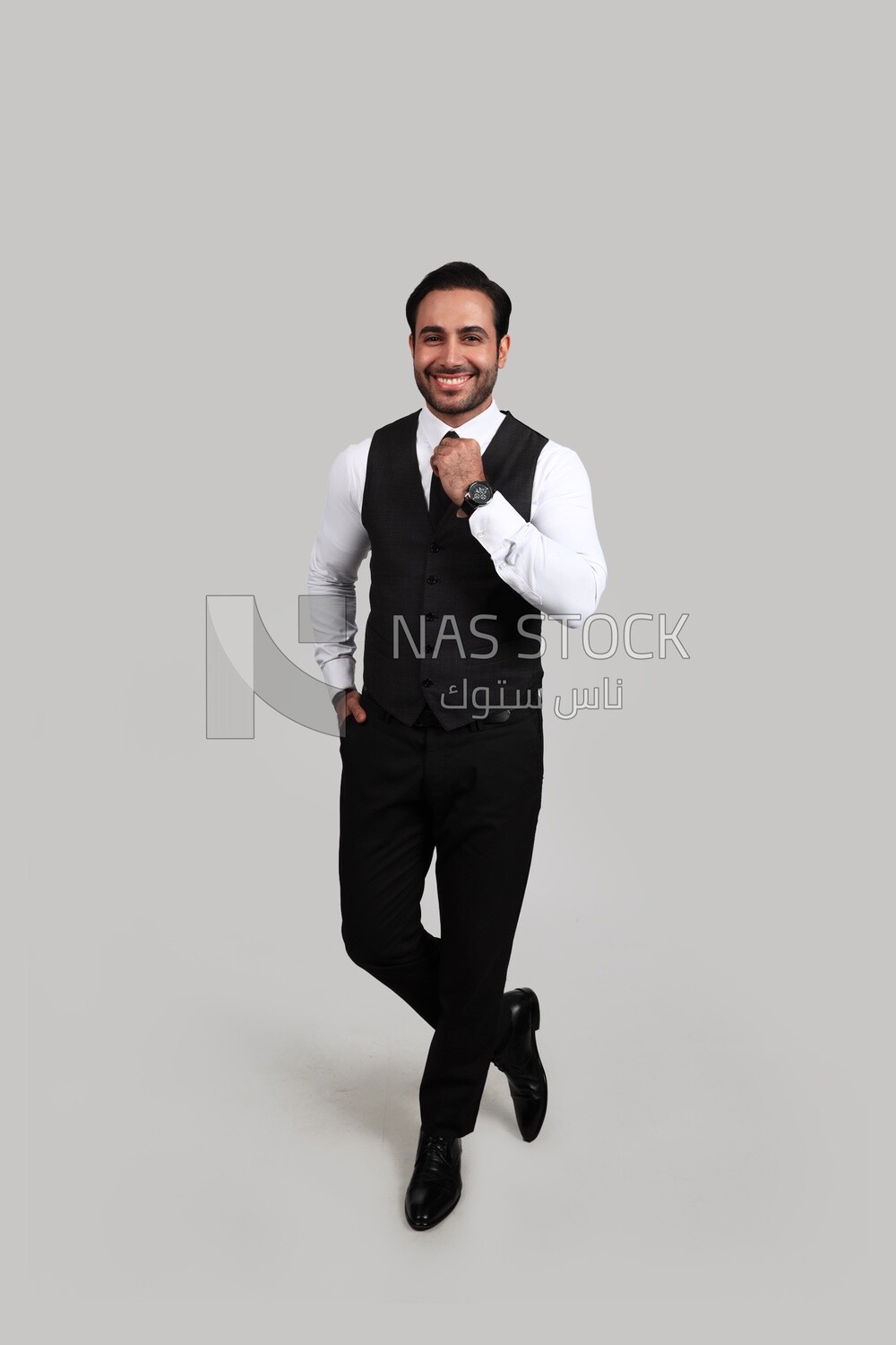 Photo of a businessman with a formal suit putting his hand on the tie, business development and partnerships, business meeting, Model
