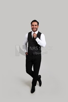 Photo of a businessman with a formal suit putting his hand on the tie, business development and partnerships, business meeting, Model