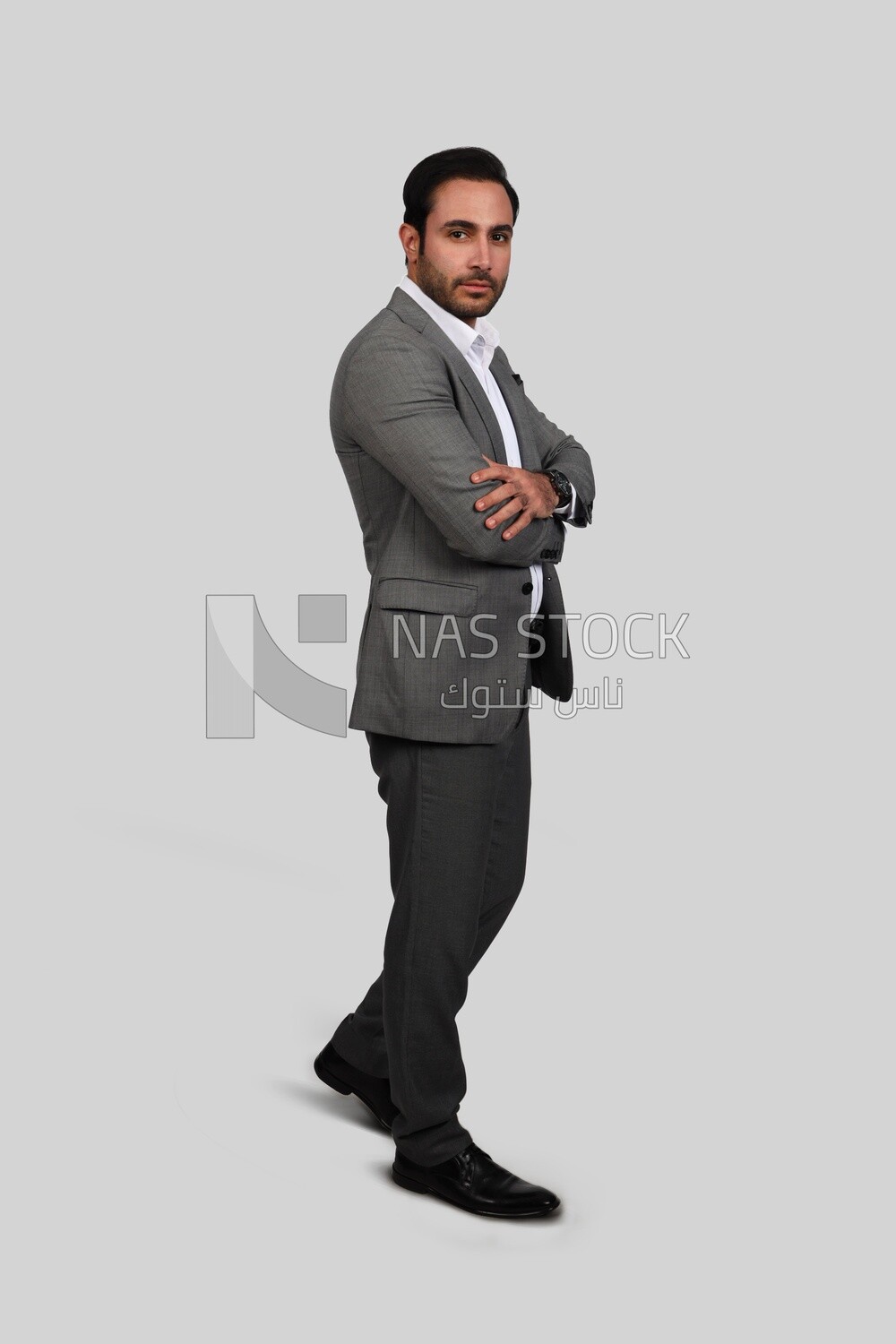 Photo of a businessman with a formal suit with crossed hands, business development and partnerships, business meeting, Model