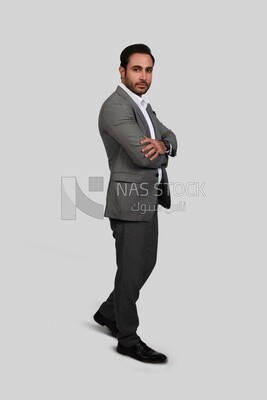 Photo of a businessman with a formal suit with crossed hands, business development and partnerships, business meeting, Model