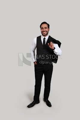 Photo of a businessman with a formal suit putting his hand in his pocket, business development and partnerships, business meeting, Model