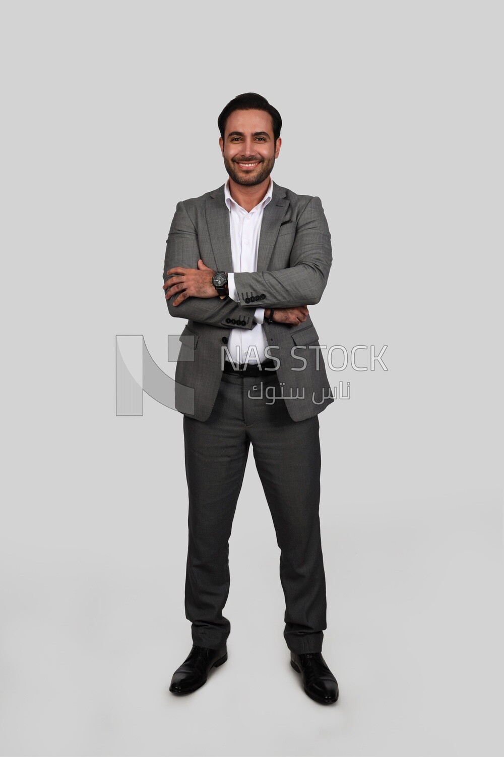 Photo of a businessman with a formal suit with crossed hands, business development and partnerships, business meeting, Model