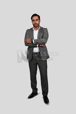 Photo of a businessman with a formal suit with crossed hands, business development and partnerships, business meeting, Model