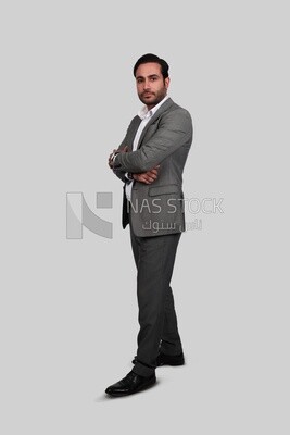 Photo of a businessman with a formal suit with crossed hands, business development and partnerships, business meeting, Model