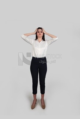 Photo of a businesswoman with formal wear putting her hand on her head looks like she is feeling a headache, business development and partnerships, business meeting, Model