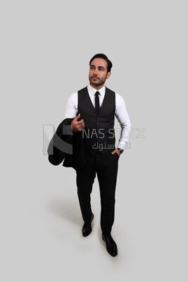 Photo of a businessman with a formal suit putting his hand in his pocket, business development and partnerships, business meeting, Model