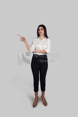 Photo of a businesswoman with formal wear pointing away, business development and partnerships, business meeting, Model