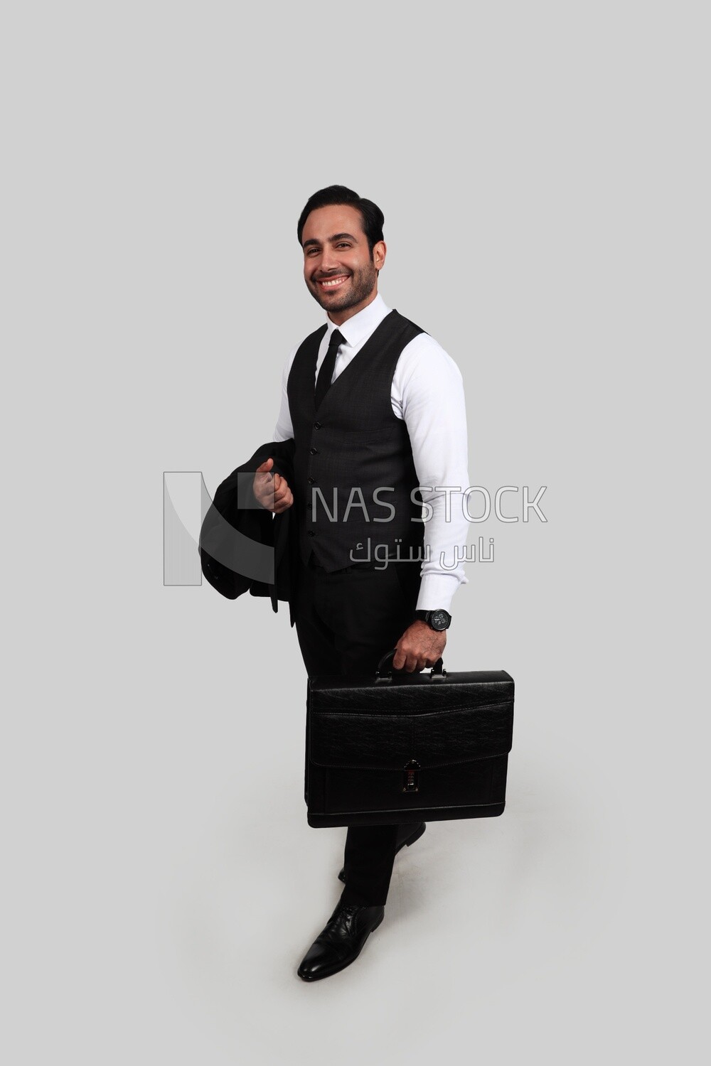 Photo of a businessman with a formal suit holding a leather bag, business development and partnerships, business meeting, Model