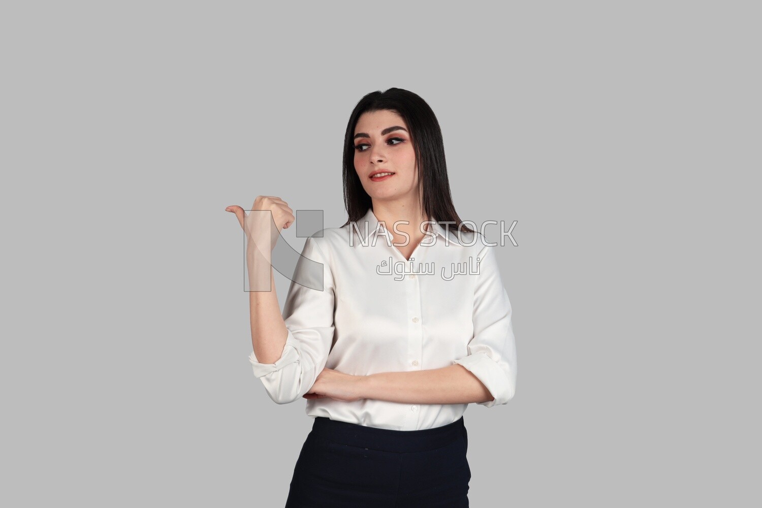 Photo of a businesswoman with formal wear pointing away, business development and partnerships, business meeting, Model