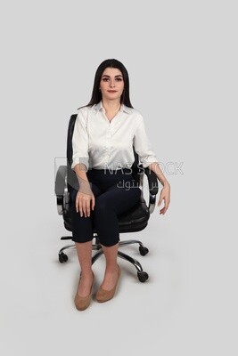 Photo of a businesswoman with formal wear sitting on the chair, business development and partnerships, business meeting, Model