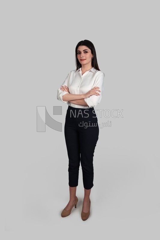 Photo of a businesswoman with formal wear with crossed hands, business development and partnerships, business meeting, Model