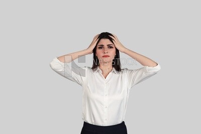 Photo of a businesswoman with formal wear putting her hand on her head looks like she is feeling a headache, business development and partnerships, business meeting, Model