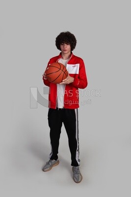 basketball player holding the ball