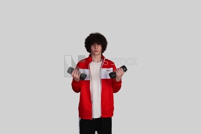 sports man doing arm exercises using gym equipment