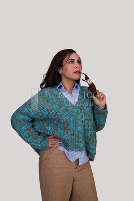 woman thinking with glasses in her mouth