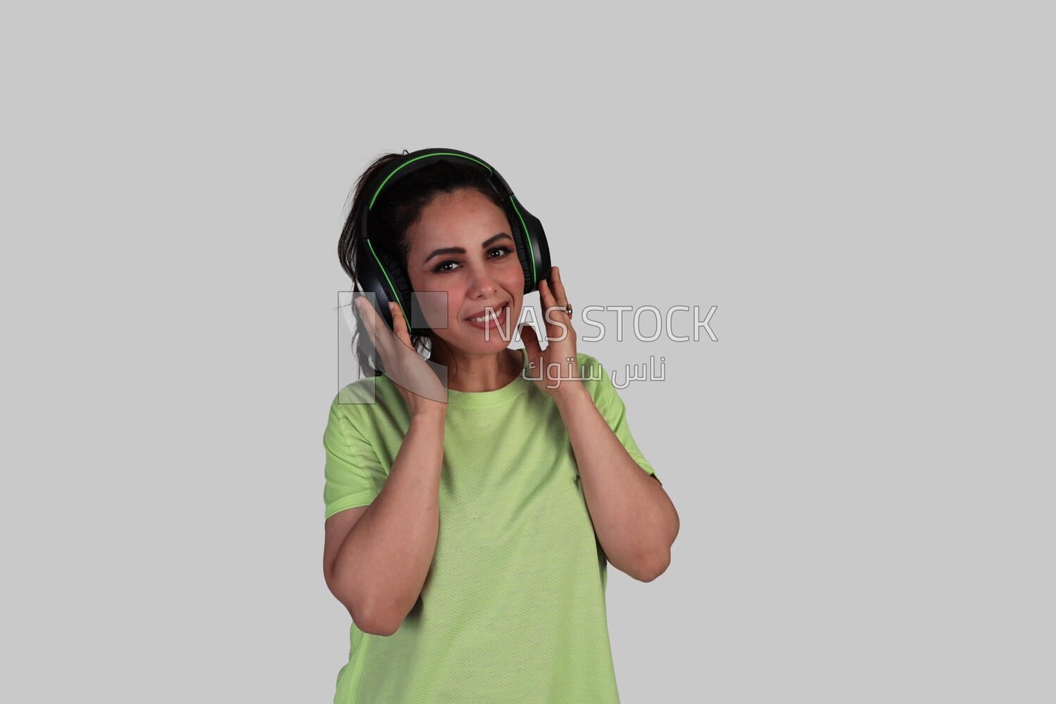 girl wearing headphones and listening to music