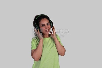 girl wearing headphones and listening to music