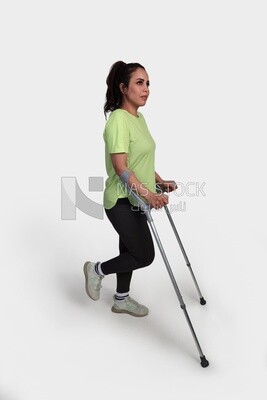 girl with an injury and using crutches