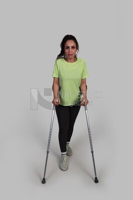girl with a foot injury and using crutches