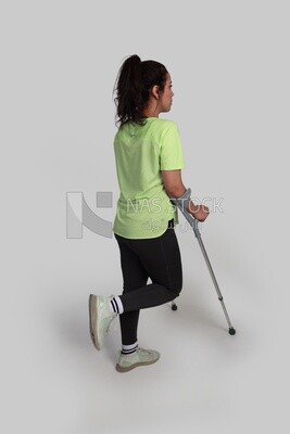 girl with a foot injury and using crutches